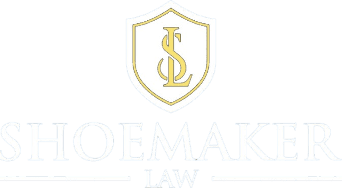 Terry Shoemaker Law white logo